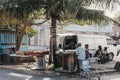 People selling fruit at a street market in Bridgetown, Barbados.